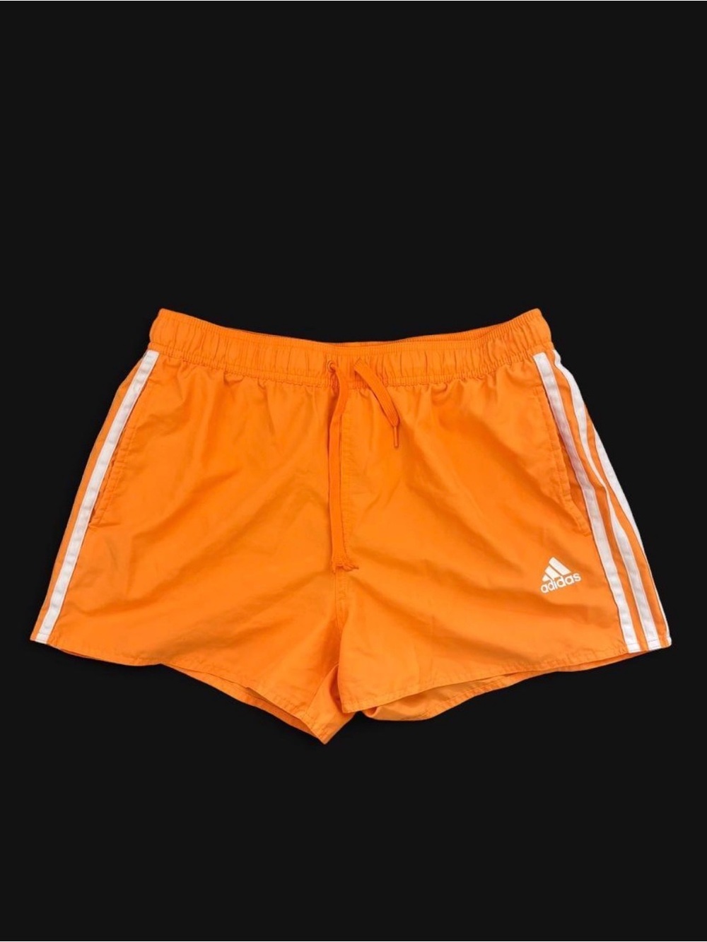 Adidas Orange Athletic Shorts with White Stripes